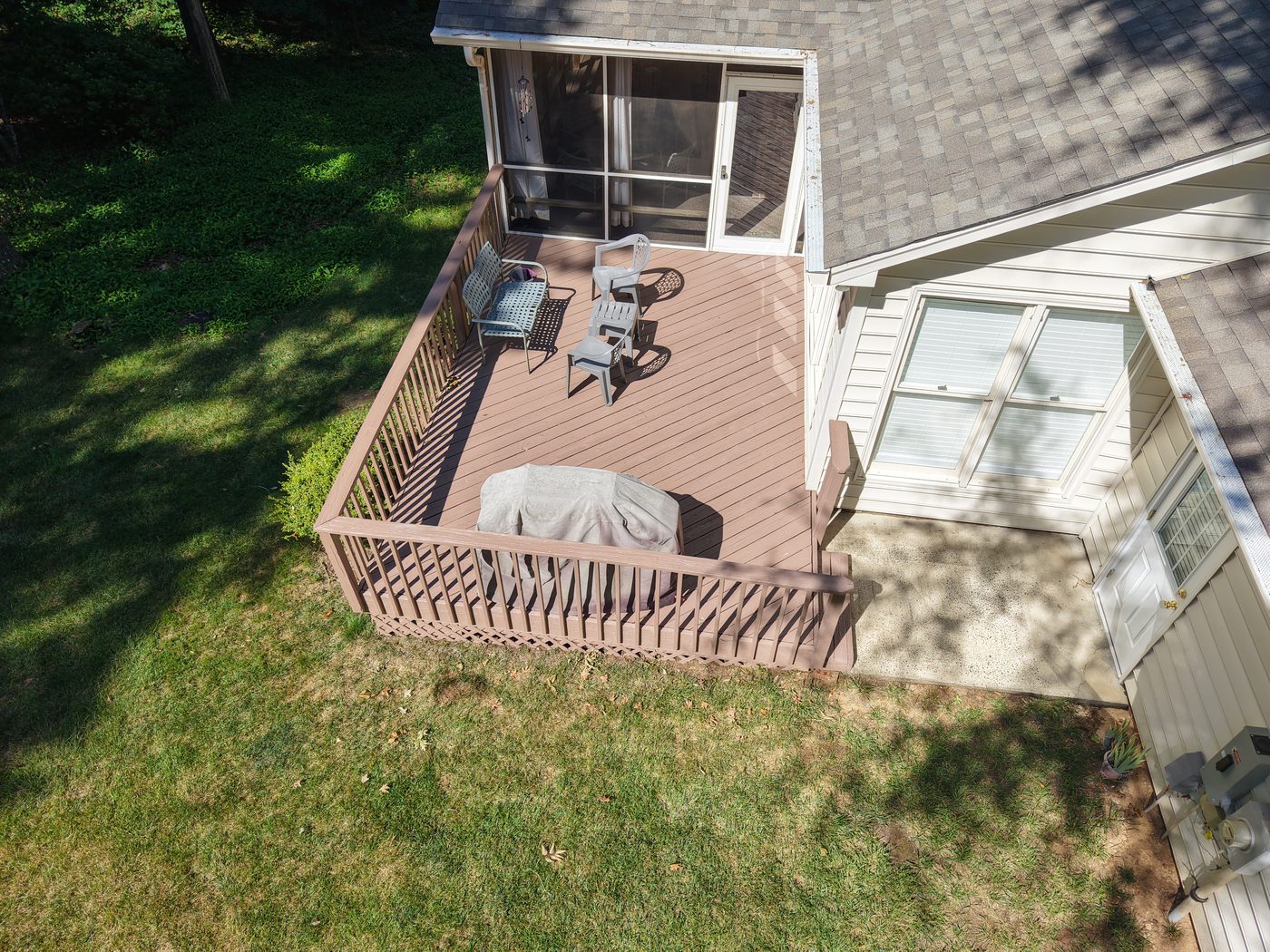 Aerial view of a repaired backyard wood deck in Charlotte, NC