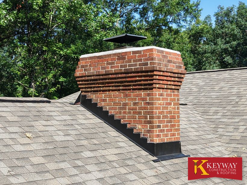 Brick chimney with new cap and flashing in Charlotte, NC